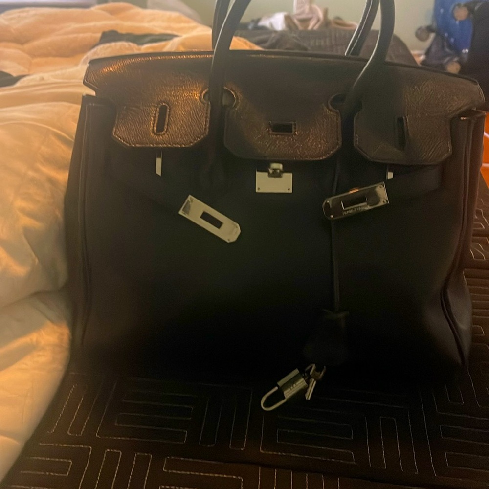 Birkin 25 leather handbag
Very good condition
Black, Leather